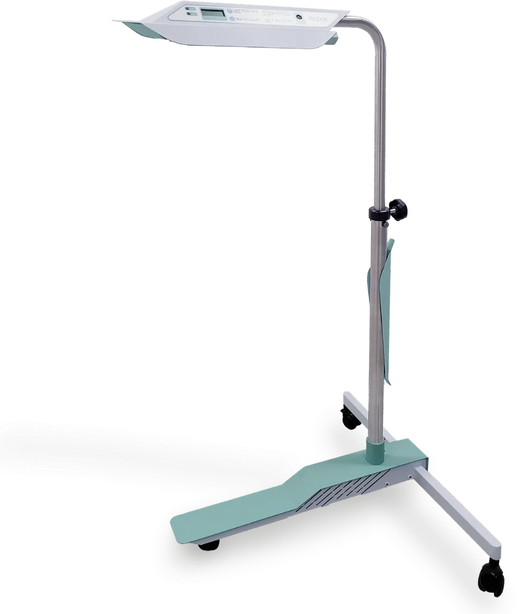Lámpara de fototerapia Bhelius Actea con columna ajustable y base rodable.